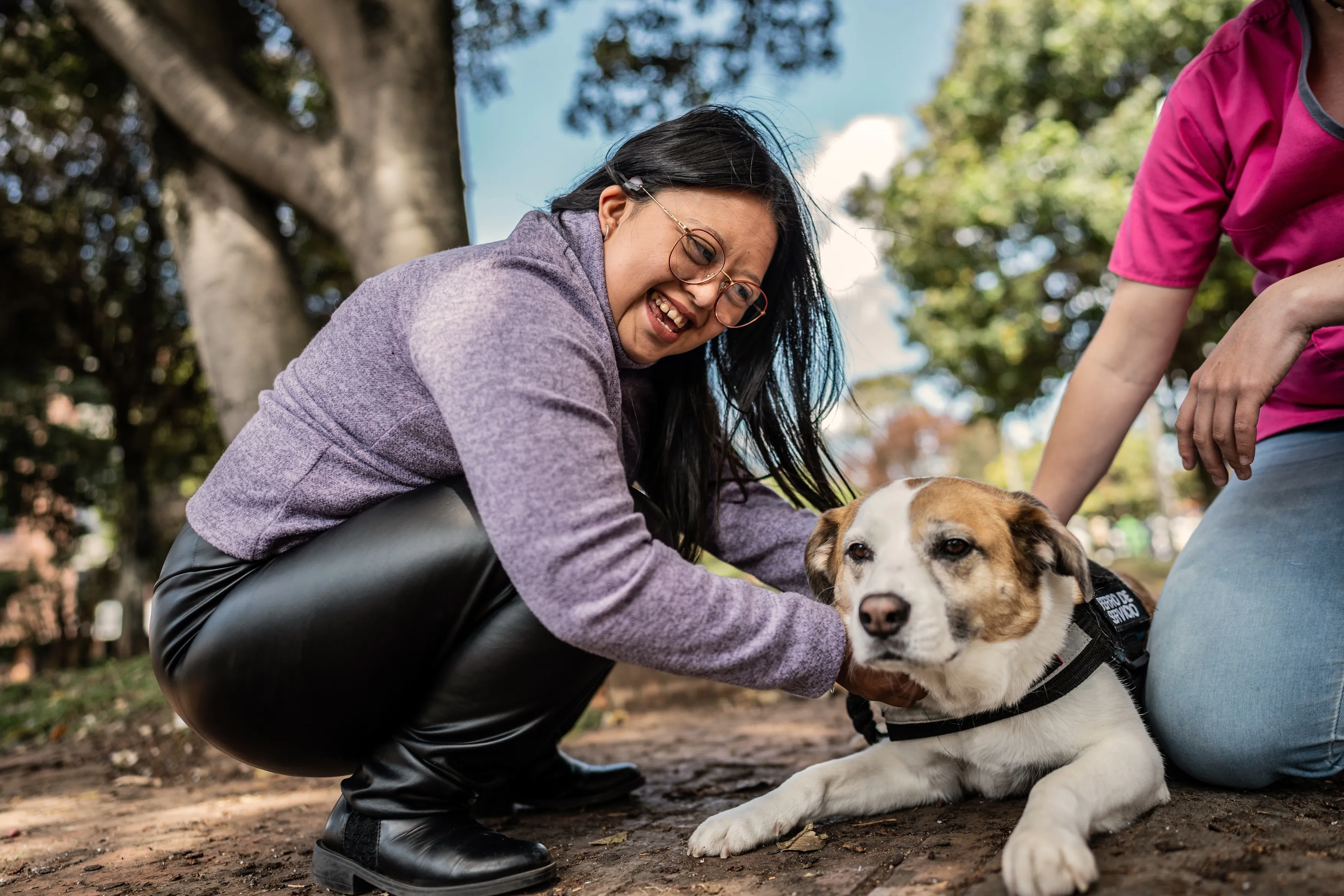 Woman with dog in park